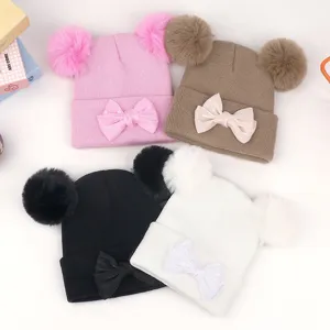 Bonnet tricoté d'hiver pour bébé avec pompon et nœud, chaud et doux pour nouveau-nés