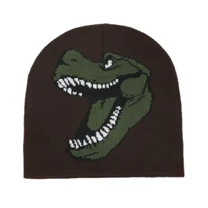 Brown knit beanie hat featuring a cool green dinosaur pattern, warm and stylish winter headwear.