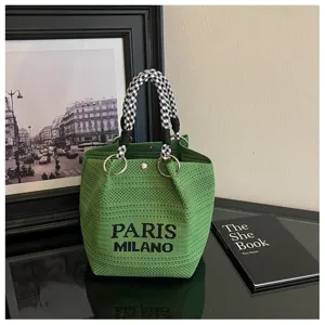Borsa a secchiello lavorata a maglia verde con manico pied de poule elegante borsa chic donna
