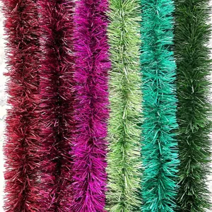 Close-up detail of thick dense colorful tinsel garland for festive party and holiday decor.