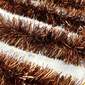 Bronze tinsel garland detail close-up, perfect for festive party decoration and holiday tree.