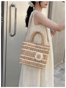 Stylish straw woven handbag for women, casual shoulder crossbody tote bag with daisy decor.