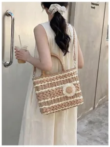 Women woven straw shoulder bag with sunflower detail, casual daily tote and crossbody handbag.