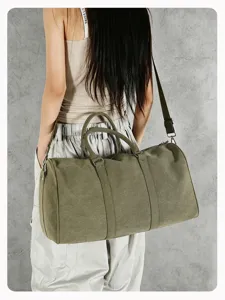 Large capacity canvas travel duffel bag, vintage military green Boston shoulder bag for use.