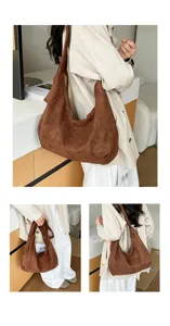 Braune Wildleder Hobo Schultertasche Detailansicht mit weicher Textur und Metallreißverschluss.