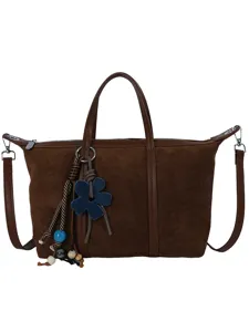 Brown suede commuter shoulder bag for women, stylish handbag with floral charm and straps.