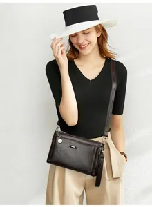 Casual retro PU leather crossbody bag, multi-layer design with dark brown finish and chic style.