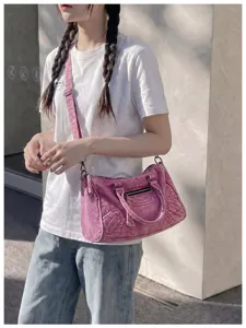 Pink washed denim motorcycle shoulder bag, detailed stitching, vintage style daily handbag.