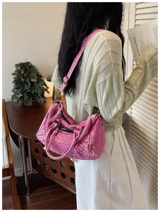 Retro pink washed denim motorcycle shoulder bag for women, vintage style crossbody tote bag.
