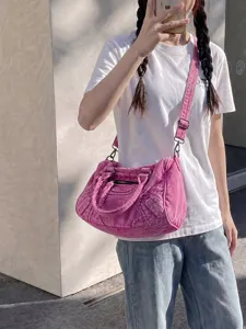 Pink washed denim motorcycle bag for women, retro style shoulder crossbody handbag.
