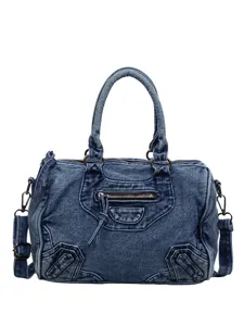 Washed denim motorcycle bag for women, retro style shoulder handbag with crossbody strap.