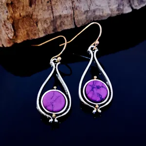 Elegant purple turquoise drop earrings with two-tone gold and silver finish, retro style.