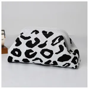 Stylish knitted clutch bag with black and white leopard print, retro frame closure for women.
