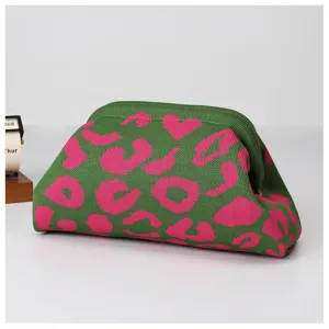 Knitted clutch bag detail view, green and pink leopard pattern frame bag for women.