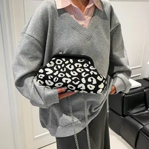 Stylish black and white leopard print cloud bag with chain strap for women fashion daily wear.