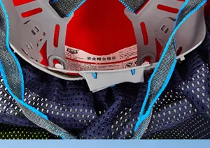 Close-up detail view of safety helmet interior suspension system and mesh sunshade.