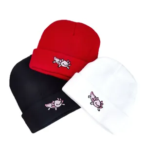 Winter knitted beanie hat featuring cute embroidered cartoon animal design, warm autumn headwear.