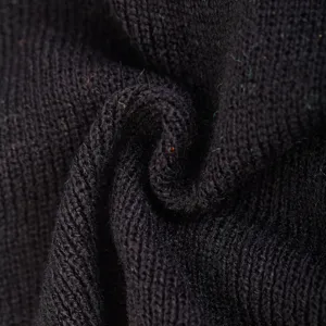 Schwarze Strickstoff Textur Nahaufnahme, hochwertiges Wollmaterial Detail für Mützen.