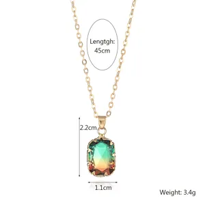 Chic rectangular gradient glass gemstone pendant necklace with gold chain for women.
