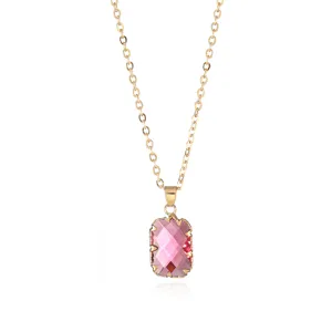 Exquisite rectangular pink crystal pendant necklace with gold chain detail, elegant jewelry.