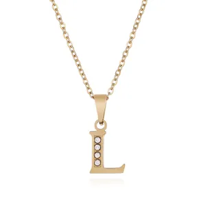 Gold letter L pendant necklace with sparkling clear rhinestones, stainless steel detail view.
