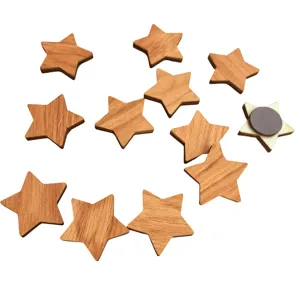Wooden star fridge magnets detail view showing natural wood grain and magnetic backing.
