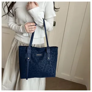 Elegant dark blue leopard print tote bag, large capacity shoulder bag for commute.