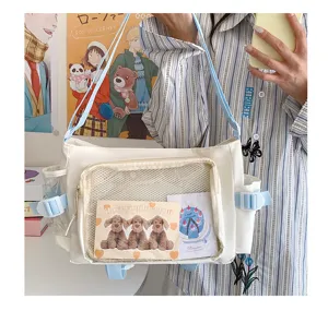 Casual white messenger Ita bag with clear window pocket, large capacity, student style shoulder bag.