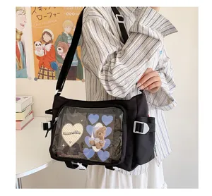 Preppy style black canvas messenger bag with transparent ita window, large capacity crossbody.