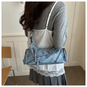 Korean style vintage blue baguette shoulder bag with multiple zippers and crossbody design.