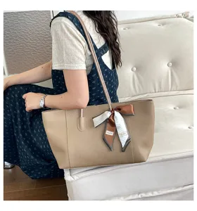 Elegante borsa tote coreana minimalista con fiocco chic per uso quotidiano casual.