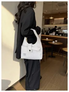 Casual commuter vintage plaid shoulder bag detail showing minimalist design and large capacity.