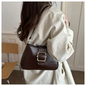 Borsa a tracolla retro in pelle marrone da donna, elegante borsa baguette con fibbia in metallo.