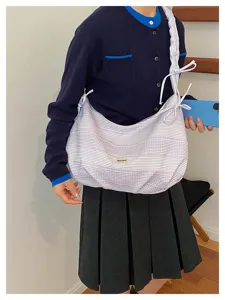 Stylish striped canvas shoulder bag large capacity casual crossbody bag for women daily commute.