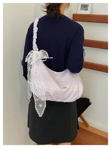 Stylish purple plaid canvas shoulder bag with sweet lace bow and unique daily commuting style.