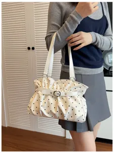 Korean style soft leather shoulder bag with chic black polka dots and stylish belt buckle detail.