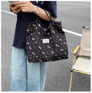 Casual floral tote bag with large capacity and stylish double rope handles for women daily use.