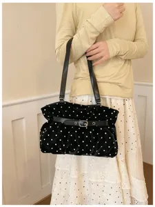 Black velvet polka dot shoulder bag for women, stylish pleated design for daily commuter use.