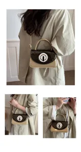 Bolso de hombro elegante para mujer con solapa de contraste y cerradura circular.