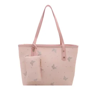 Borsa shopper rosa in pelle con farfalle argentate, elegante borsa a spalla con pratica pochette.