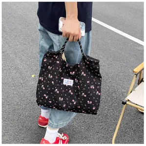 Stylish black floral quilted tote bag, large capacity casual shoulder bag for women daily use.