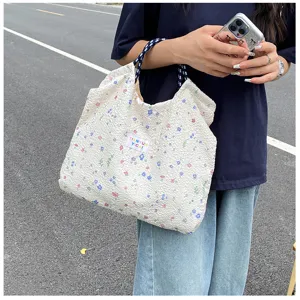 Casual floral print bubble textured tote bag for women, large capacity daily shoulder bag.
