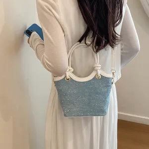 Women fashion denim bucket bag, casual chic shoulder handbag, versatile summer daily style.