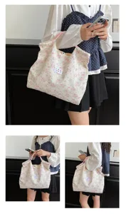 Stylish floral canvas shoulder bag for women, large capacity casual tote handbag daily use.