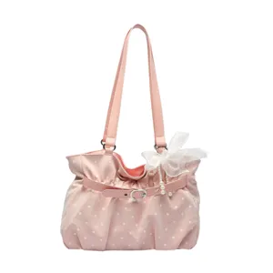 Pink polka dot pleated shoulder bag for women, cute bow pearl crossbody tote bag commuting.