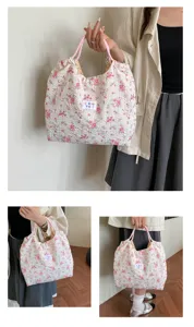 Floral quilted tote bag for women, large capacity shoulder handbag with pink handles.