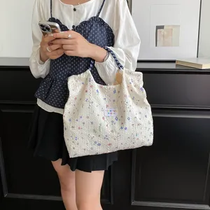 Floral quilted tote bag for women, stylish large capacity shoulder handbag everyday casual use.