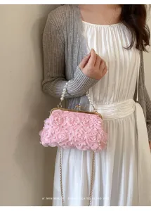 Sac pochette perle florale rose pour femmes, élégant sac bandoulière rétro pour soirée chic.