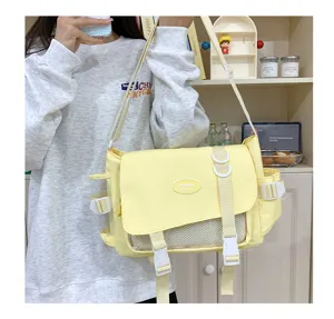 Canvas messenger ita bag with transparent pocket, casual college style cross-body bag for women.