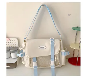 College style white messenger bag with blue straps, canvas crossbody bag for daily casual use.